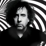 Tim Burton is making the rounds at Cannes with reports saying he’s there to pitch a top-secret movie project